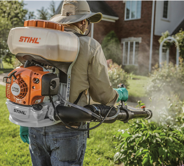 BML tech using backpack sprayer for targeted mosquito control
